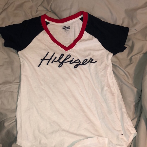 A Tommy Hillfiger v-neck t-shirt. - Picture 1 of 3